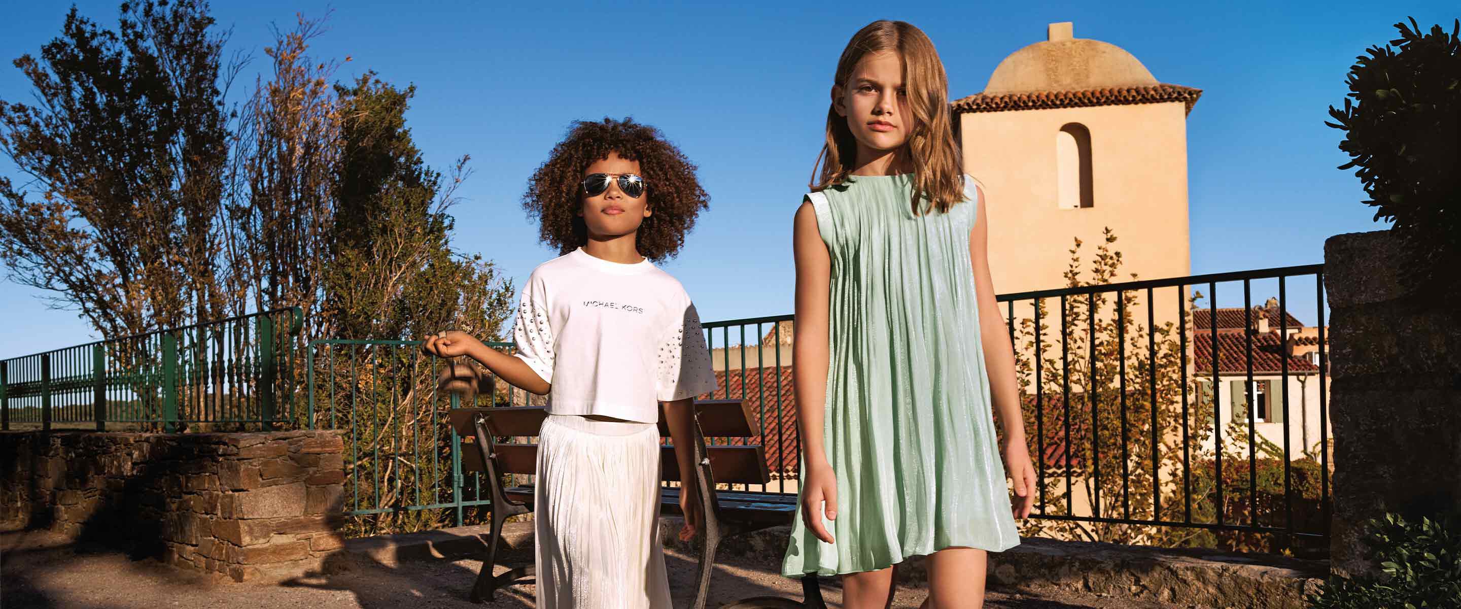 Abbigliamento per bambini marca Michael Kors su Kids around