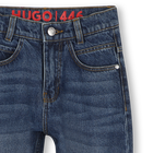 Pantaloni in denim HUGO 
                    RAGAZZO