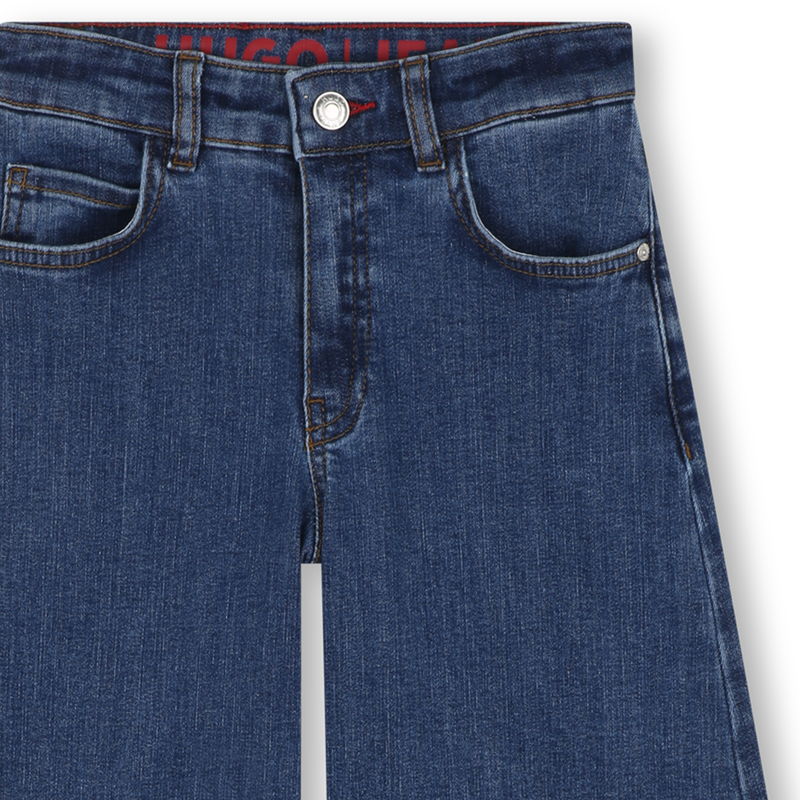 Pantaloni in denim HUGO 
                        BAMBINA