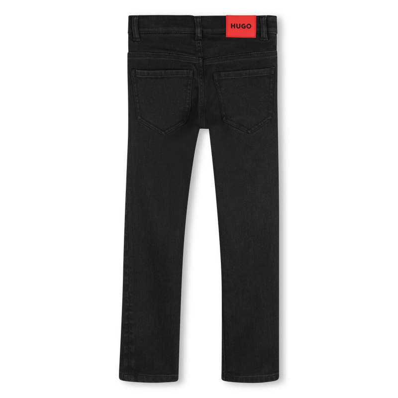 Pantaloni in denim HUGO 
                        RAGAZZO