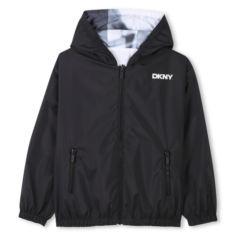 Giacca a vento reversibile. DKNY 
                        RAGAZZO