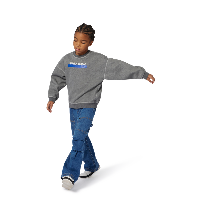 Felpa reversibile DKNY 
                        RAGAZZO