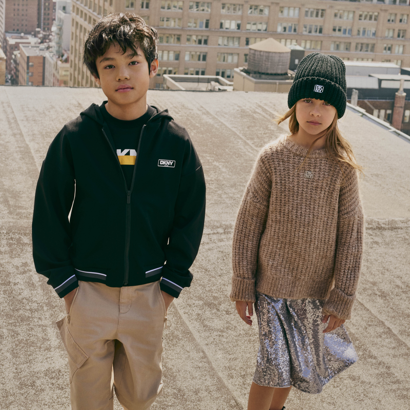 Pantaloni in twill DKNY 
                        UNISEX