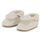 Pantofole in morbida pelle di pecora BOSS 
                    UNISEX