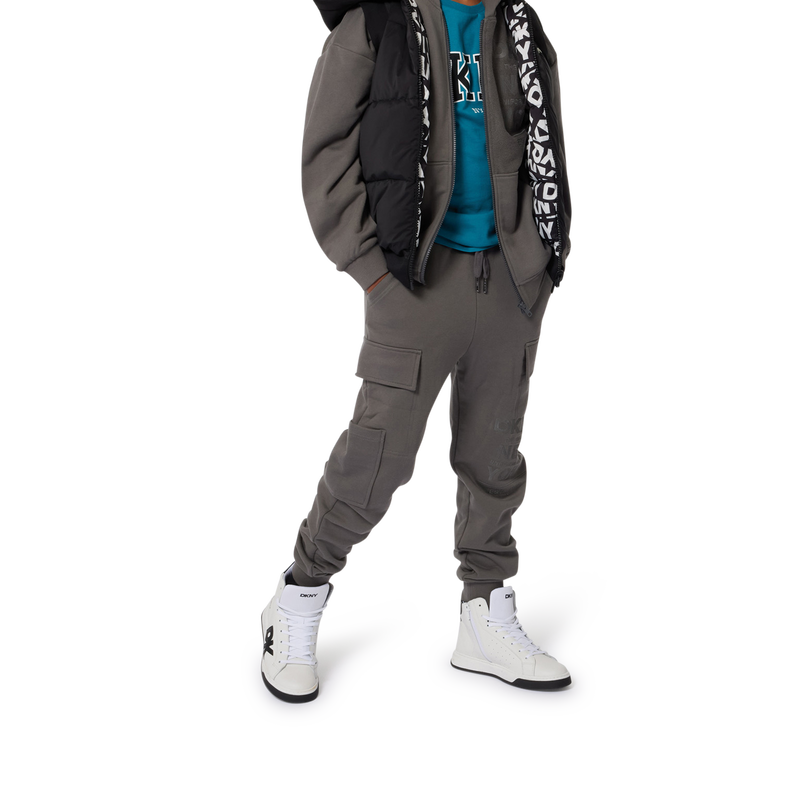 Piumino smanicato cappuccio DKNY 
                        UNISEX