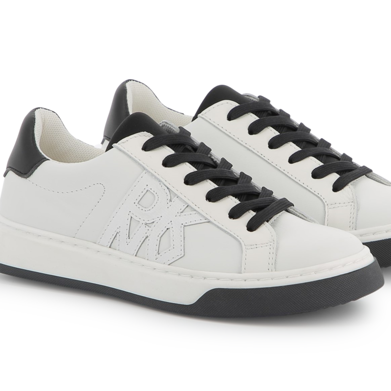 Sneakers con lacci in pelle DKNY 
                        UNISEX