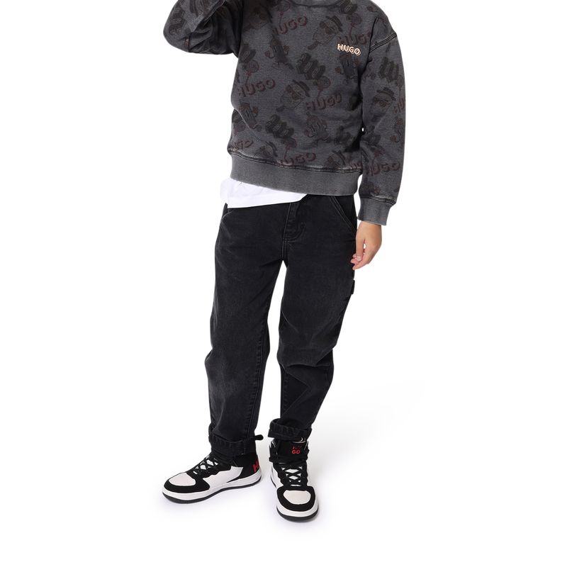 Jeans larghi a tinta unita HUGO 
                        RAGAZZO