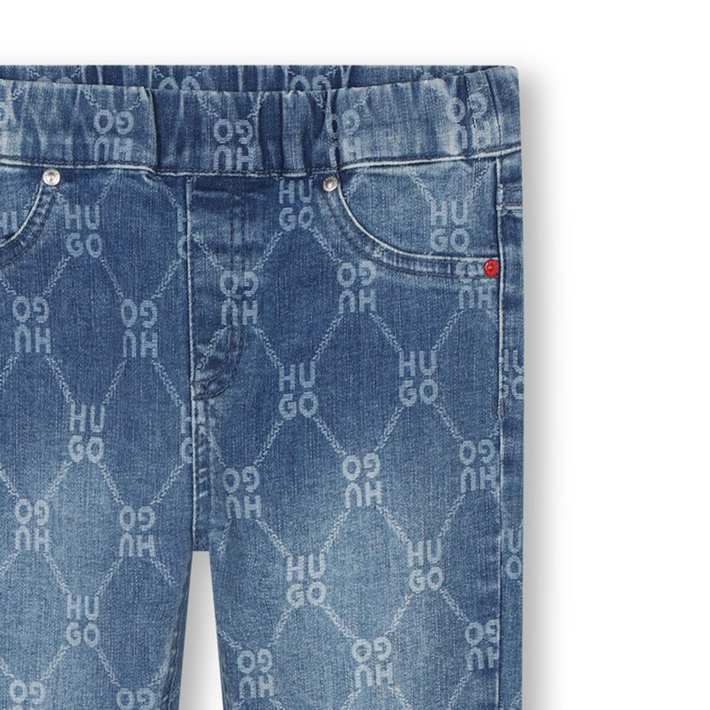 Jeans aderenti stampati HUGO 
                        BAMBINA