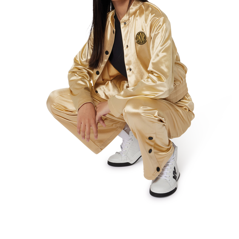 Pantaloni ampi lucidi DKNY 
                        BAMBINA