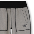 Pantaloni reversibili DKNY 
                    RAGAZZO