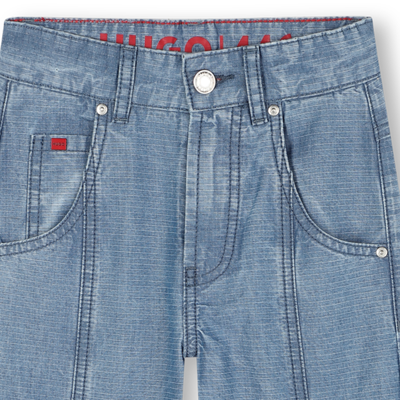 Pantaloni in denim HUGO 
                        BAMBINA