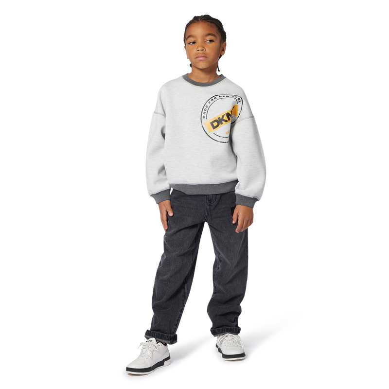 Felpa reversibile DKNY 
                        RAGAZZO