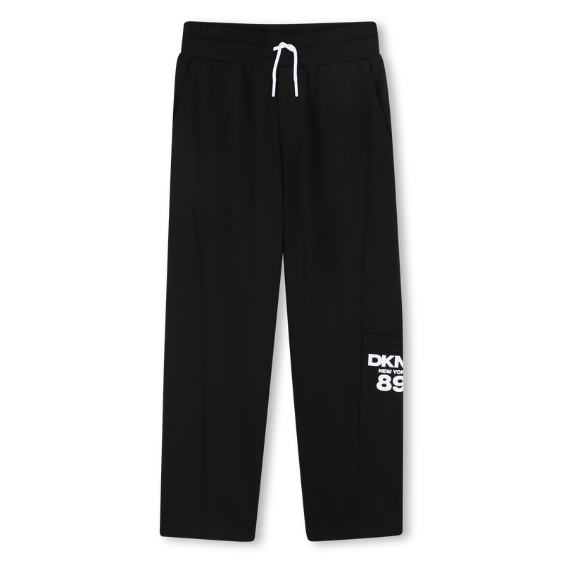 PANTALONI CON TASCHE DKNY 
                        UNISEX