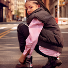 Piumino senza maniche DKNY 
                    BAMBINA