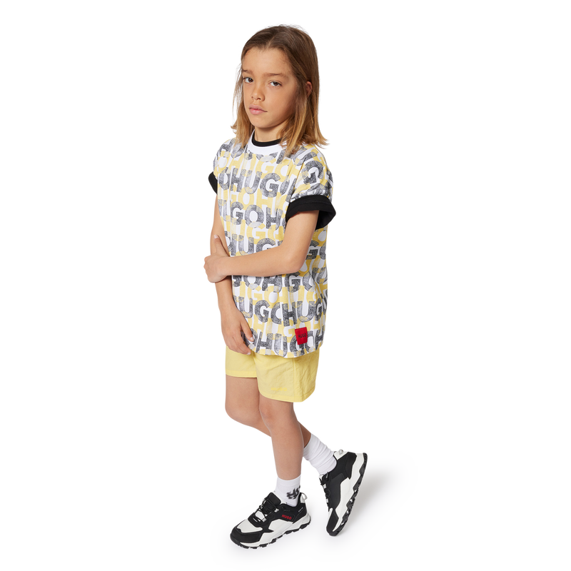 T-shirt con stampa all-over HUGO 
                        RAGAZZO
