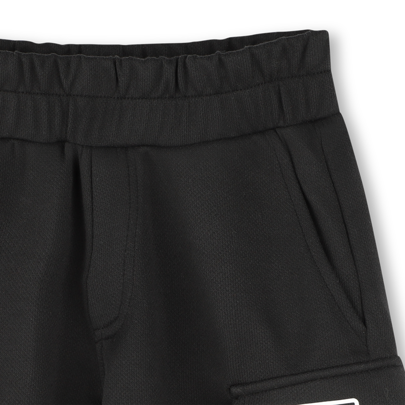 Bermuda con tasche DKNY 
                        UNISEX