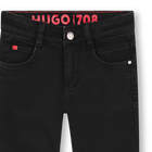 Pantaloni in denim HUGO 
                    RAGAZZO