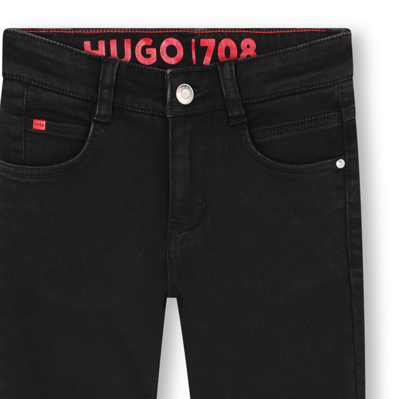 Pantaloni in denim HUGO 
                        RAGAZZO