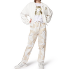 Pantaloni in lino e cotone DKNY 
                    BAMBINA