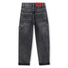 Pantaloni in denim HUGO 
                    RAGAZZO