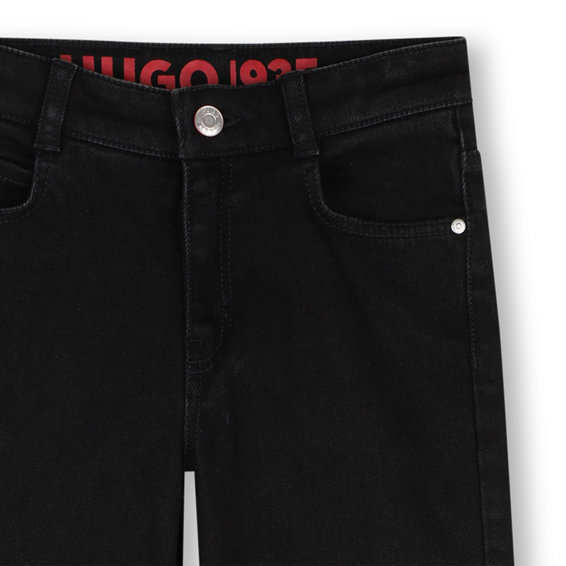 Pantaloni in denim HUGO 
                        BAMBINA
