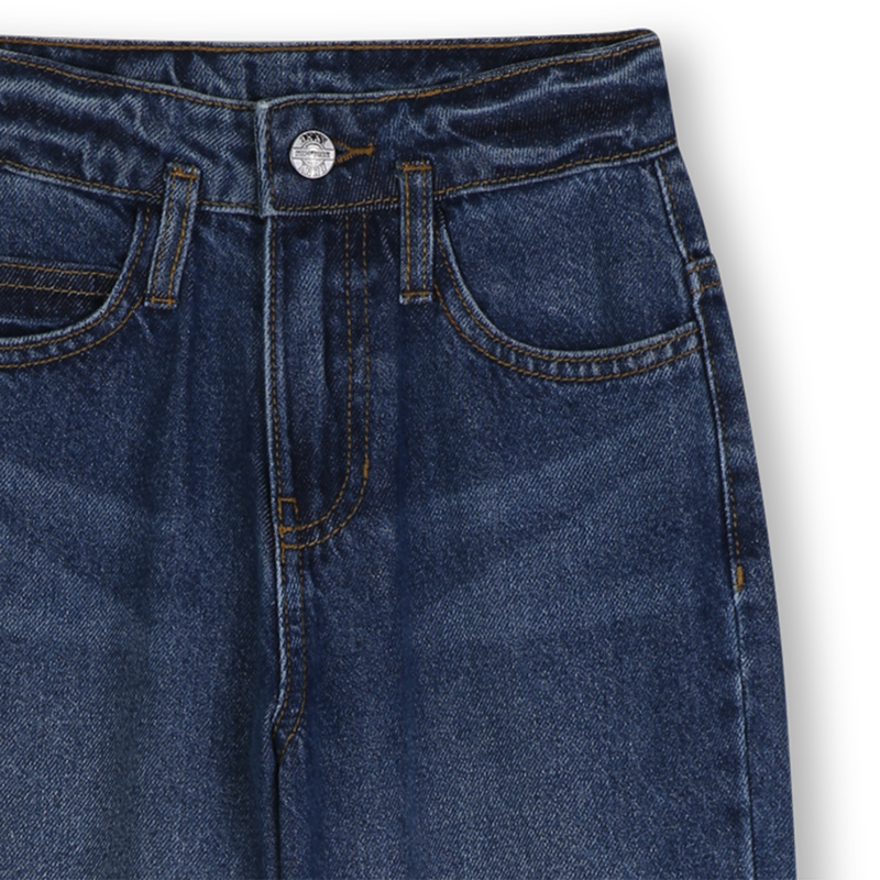Pantaloni in denim DKNY 
                        UNISEX