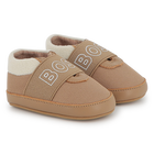 Pantofole in morbida pelle di pecora BOSS 
                    UNISEX