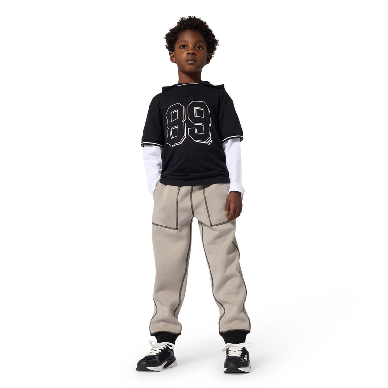 T-shirt fantasia DKNY 
                        RAGAZZO