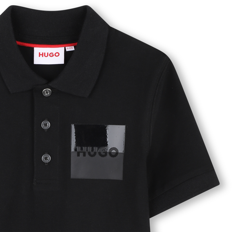Polo a maniche corte HUGO 
                        RAGAZZO