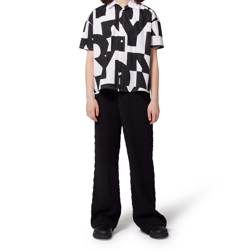 Zoccoli in pelle con velcro DKNY 
                        UNISEX