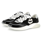 Sneakers con lacci e badge KARL LAGERFELD KIDS 
                    BAMBINA