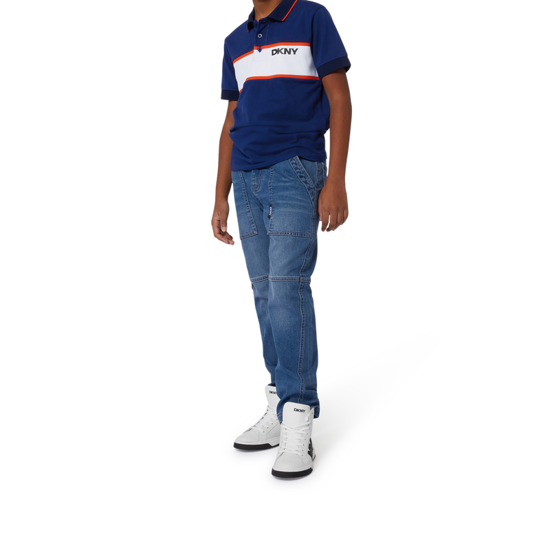 Jeans quattro tasche DKNY 
                        UNISEX