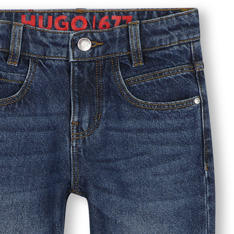 Pantaloni in denim HUGO 
                        RAGAZZO