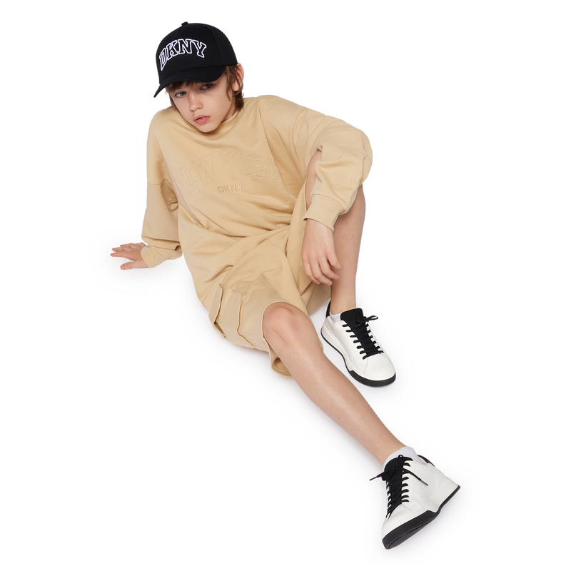 Sneakers con lacci in pelle DKNY 
                    UNISEX