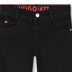 Pantaloni in denim HUGO 
                    RAGAZZO