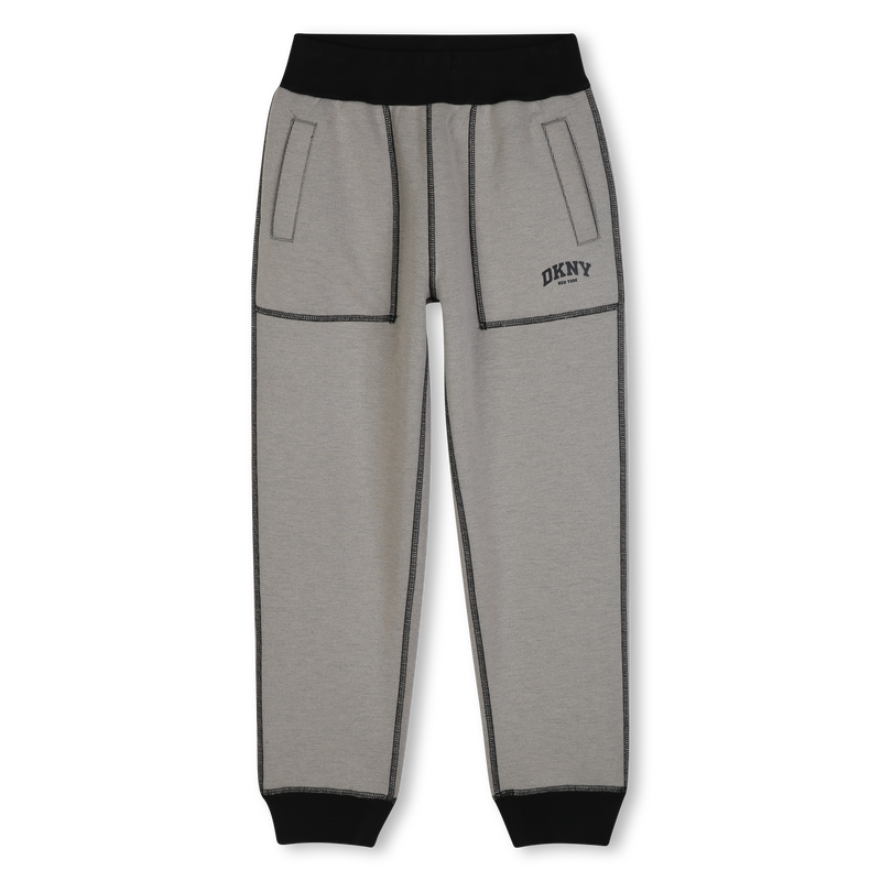 Pantaloni reversibili DKNY 
                        RAGAZZO