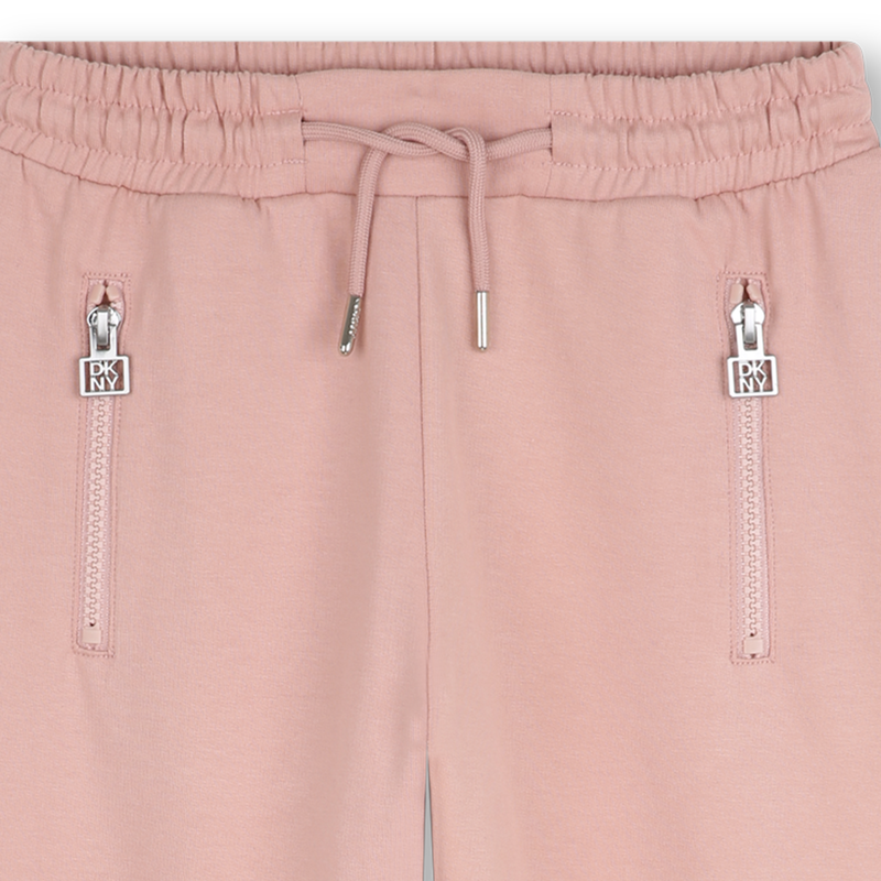 Pantaloni in pile DKNY 
                        BAMBINA