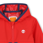 Giacca a vento con cappuccio TIMBERLAND 
                    RAGAZZO