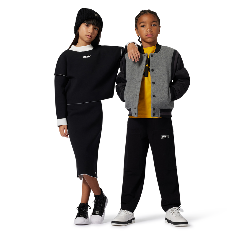 Maglione reversibile in maglia DKNY 
                        BAMBINA