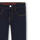 Pantaloni in denim HUGO 
                    RAGAZZO