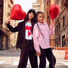 Pantaloni con pince e risvolti DKNY 
                    BAMBINA