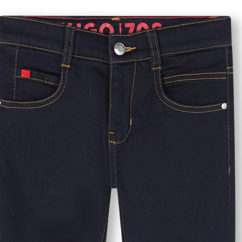 Pantaloni in denim HUGO 
                        RAGAZZO