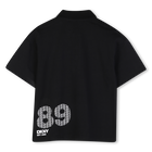 Polo a maniche corte DKNY 
                    RAGAZZO